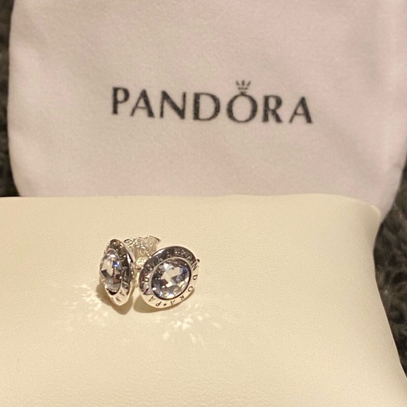 Pandora Jewelry - Pandora Radiant Logo cubic zirconia and silver studs, new. Shine logo